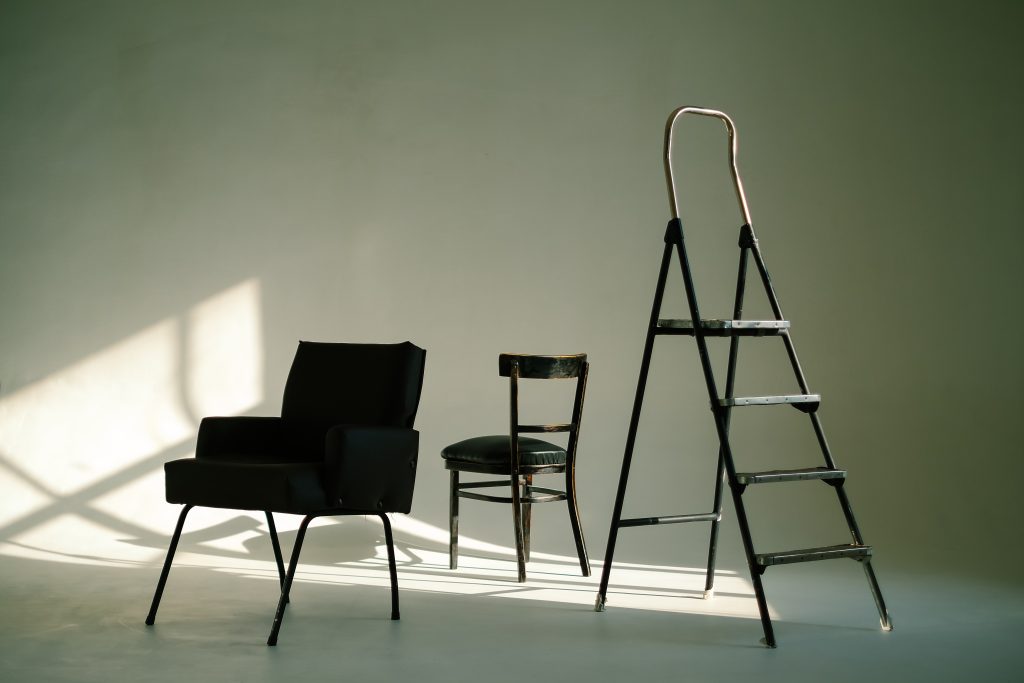 chairs furniture and ladder in empty white room 2022 08 19 07 00 58 utc