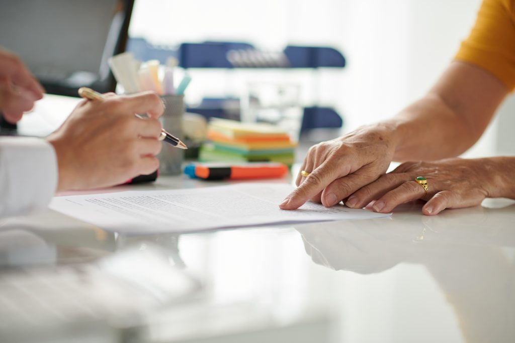 senior woman signing document 2023 01 31 02 36 47 utc